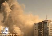 قصف مقر الإعلامیین.. الاحتلال تدمر برج "الجلاء" في غزة