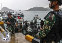 Members of the Indonesian Navy’s special forces disembark